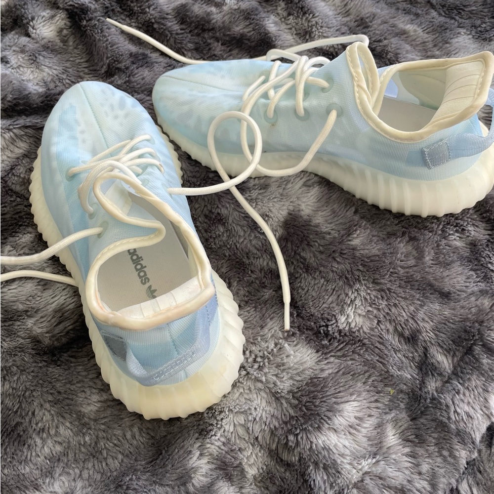 Adidas running shoes. These run big, they fit like a 7.5 women’s